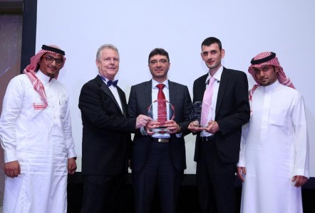 Eng. Safwan Al Khatib, Managing Director of Smart Link (center) along with his team receiving the award from INSIGHTS' President Dominick Keenaghan